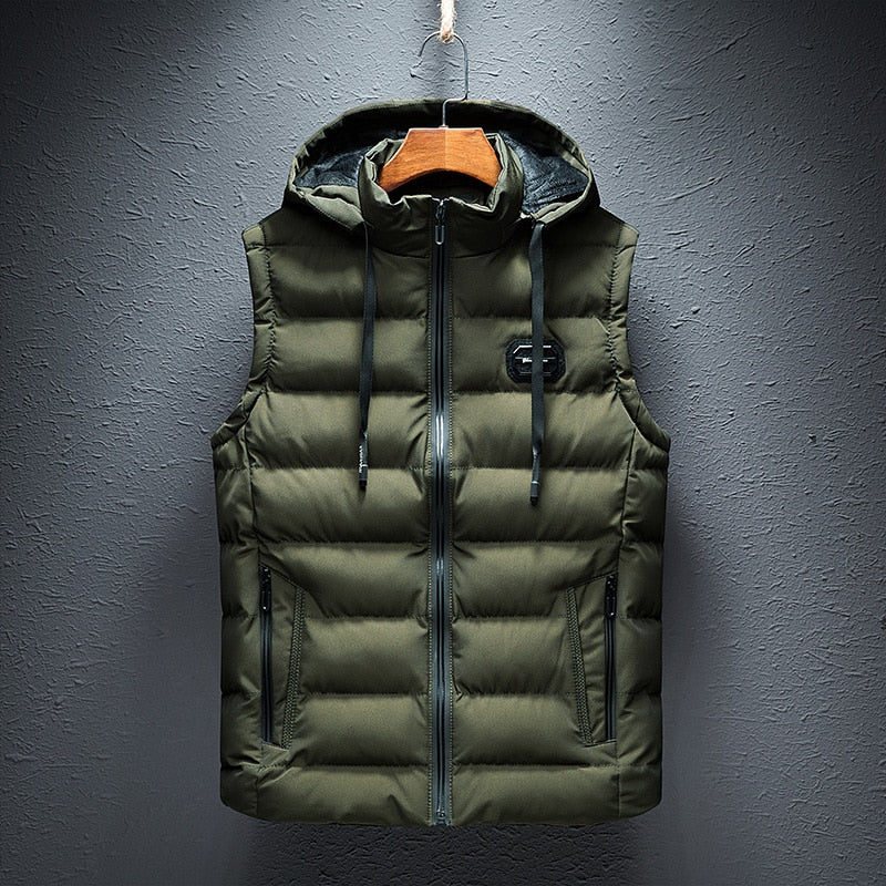 Front product hanging view of the reversible hooded channel-quilted puffer vest in dark olive green.