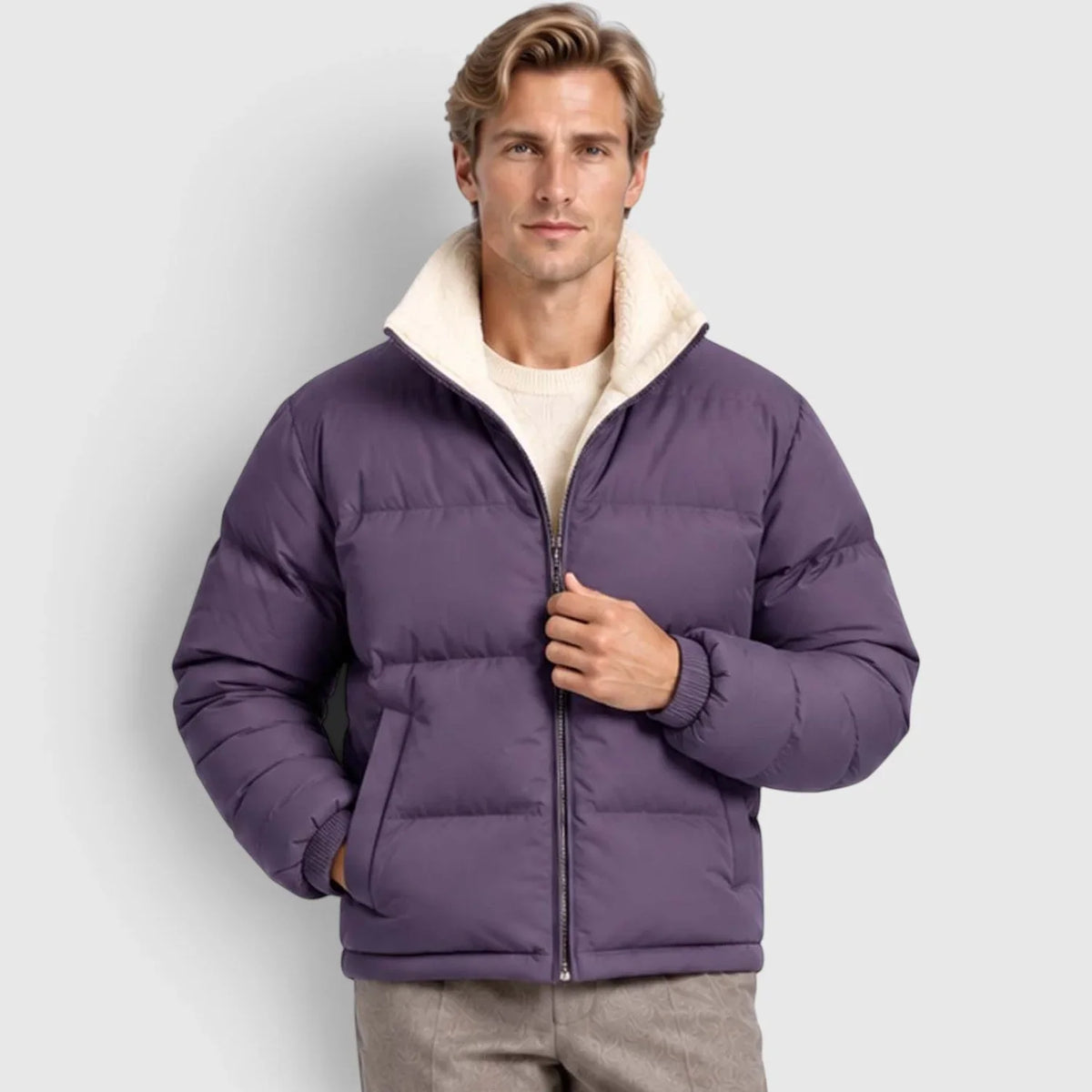 Purple reversible puffer jacket with wide channel quilting, plush cream stand collar, and rib-knit cuffs.