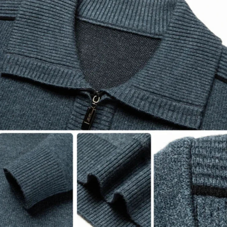 Close-up of the blue-gray polo showing the wide spread collar, quarter-zip, and ribbed texture.