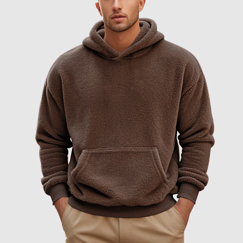 Sherpa Fleece Pullover Hoodie – Brown hoodie worn by a male model with kangaroo pocket and ribbed cuffs