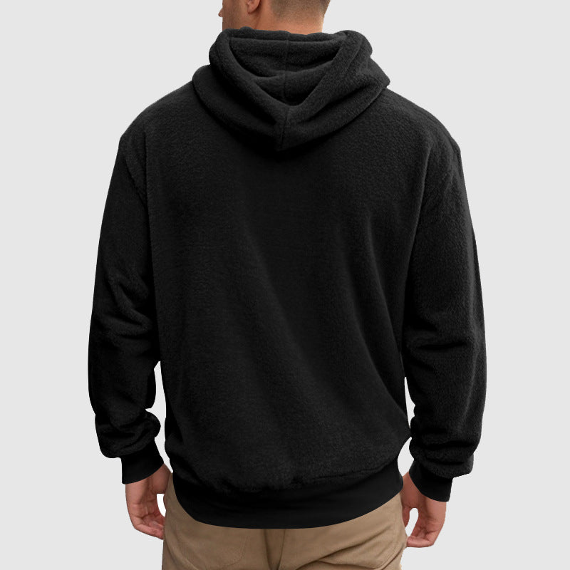 Sherpa Fleece Pullover Hoodie – Back view of a black hoodie worn by a male model