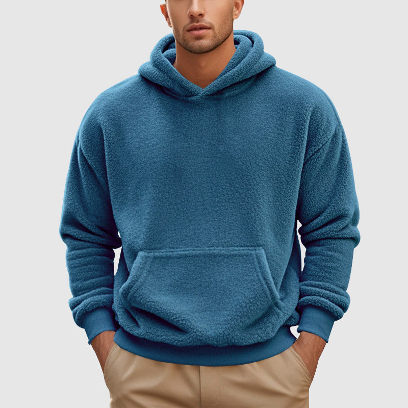 Sherpa Fleece Pullover Hoodie – Blue hoodie worn by a male model with relaxed fit and kangaroo pocket