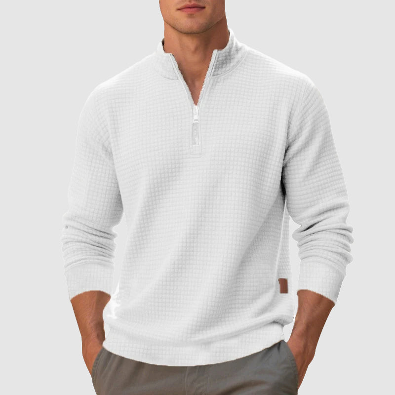 White waffle knit quarter-zip pullover with a stand collar, ribbed cuffs, and a trim, mid-weight fit.
