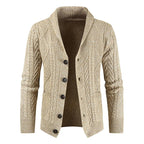 Beige cable-knit shawl-collar cardigan with a single-breasted button front and front patch pockets.