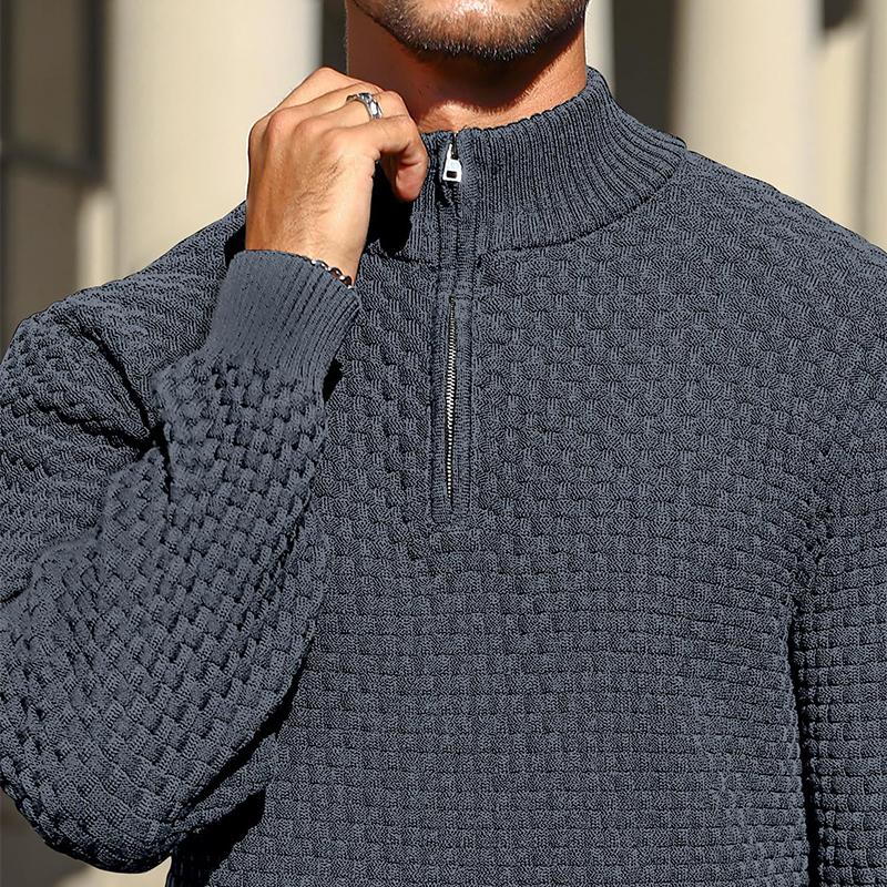 Charcoal grey quarter-zip sweater in a structured basket-weave cotton knit with a ribbed collar and metal hardware.