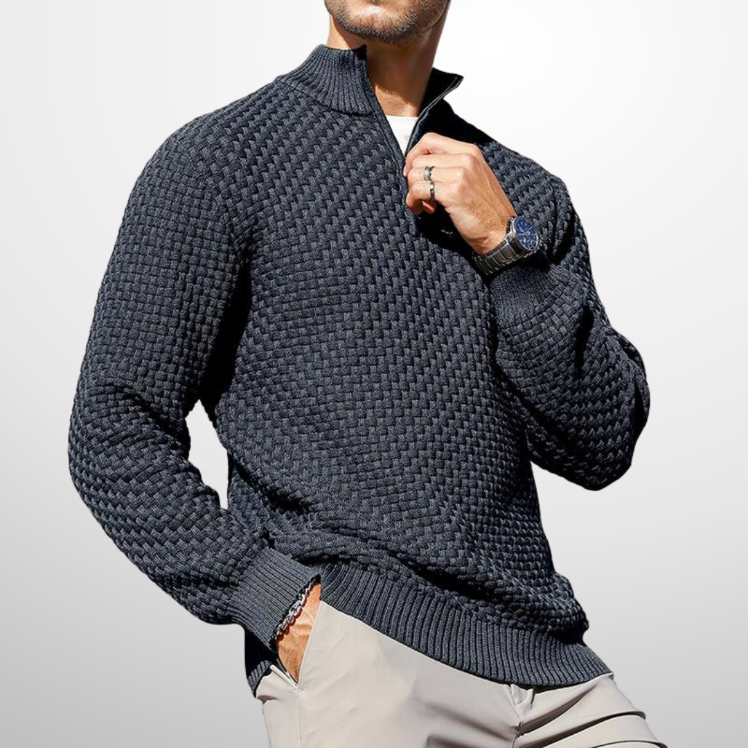 Charcoal quarter-zip sweater in a structured basket-weave knit with a tailored fit and metal hardware detail.