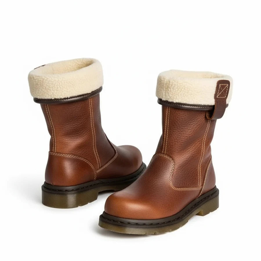 Pair of brown vegan leather boots for women with cream shearling-look cuff and low stacked sole