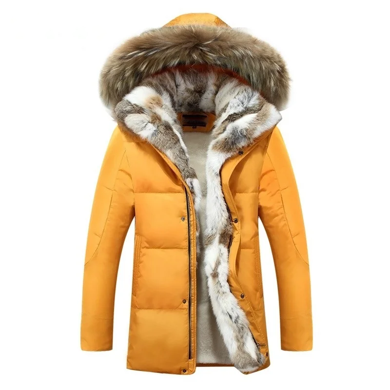 Mustard yellow duck down parka with a plush-trimmed hood, quilted shell, and soft sherpa interior lining.