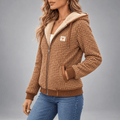 Sherpa-Lined Hooded Jacket – Brown textured check jacket worn by a female model in a side-facing stance