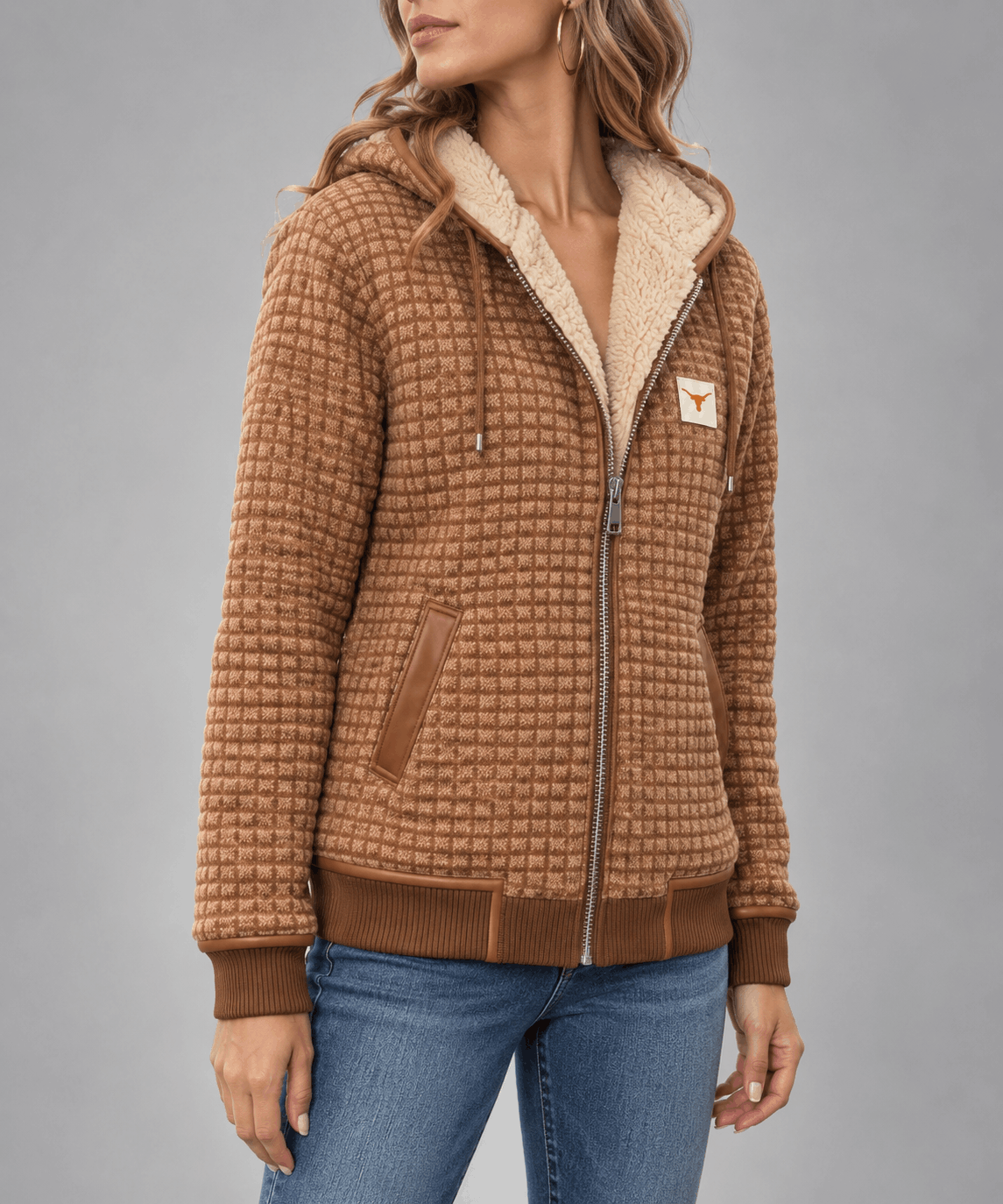 Sherpa-Lined Hooded Jacket – Brown textured check jacket worn by a female model with full-zip front, contrast piping and patch pockets