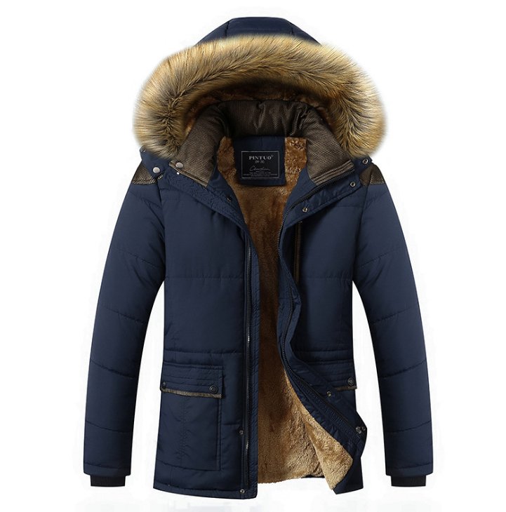 Navy blue puffer jacket with a plush sherpa lining, faux fur hood trim, contrast shoulder yoke, and snap-flap pockets.