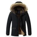 Black quilted puffer jacket with sherpa lining, plush-trim hood, contrast shoulder yoke, and snap-flap pockets.