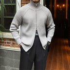 Light grey ribbed cotton-blend zip-up cardigan with a structured stand collar and slim, tailored fit.