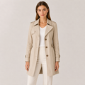 Beige Slim-Fit Lightweight Trench Coat worn by a female model, featuring a classic collar, double-breasted button front, long sleeves, and tailored fit.