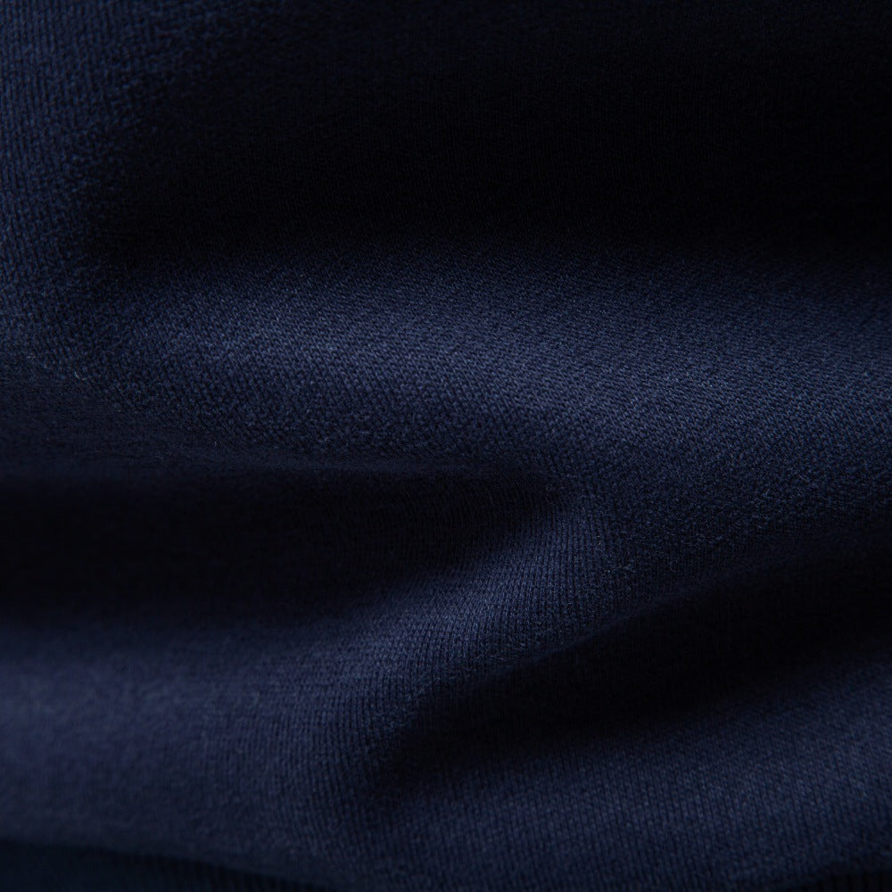 Close-up of navy sweatshirt showing soft fabric texture