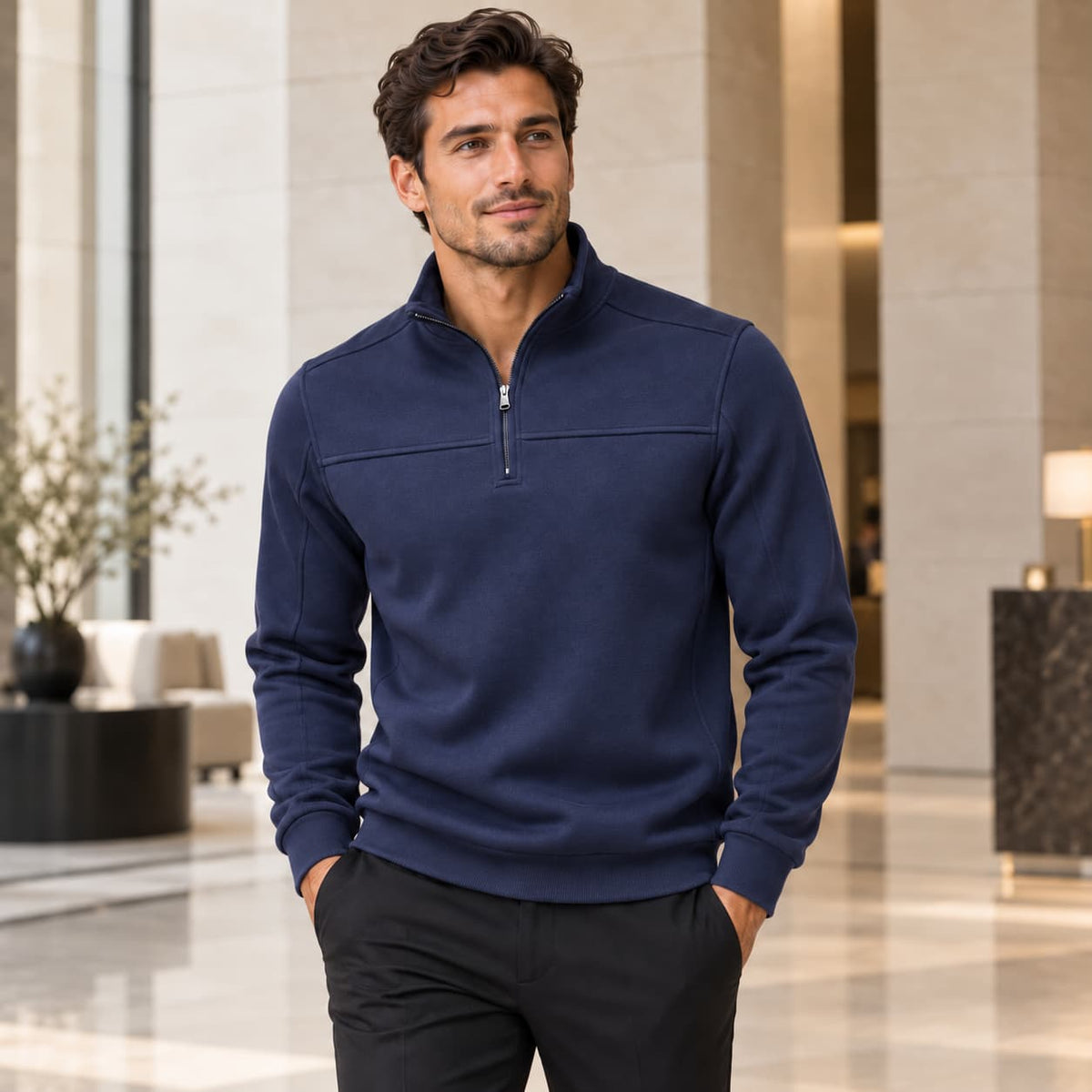 Stand collar quarter-zip sweatshirt worn by a male model in navy, front view