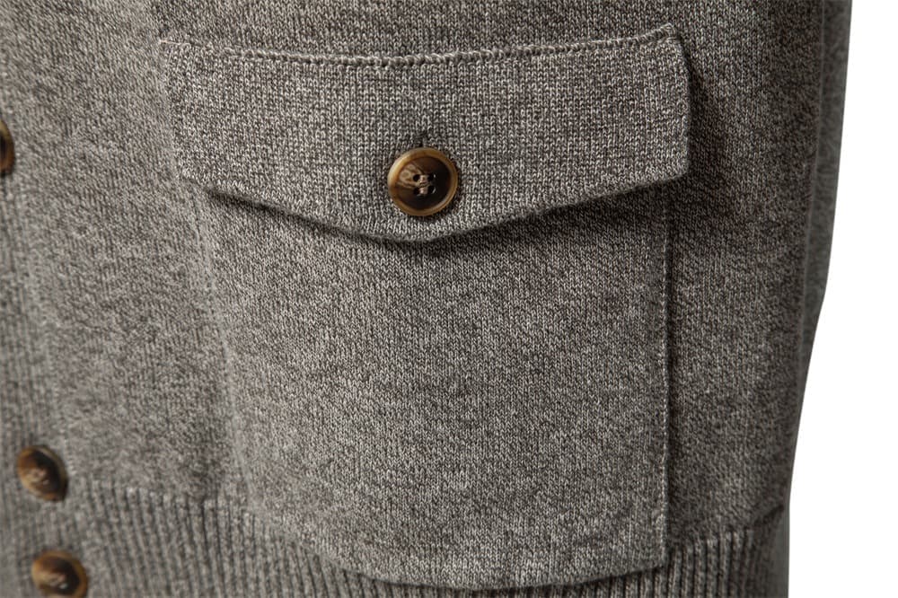 Grey stretch cotton knit cardigan featuring a buttoned flap pocket and ribbed hem detail.