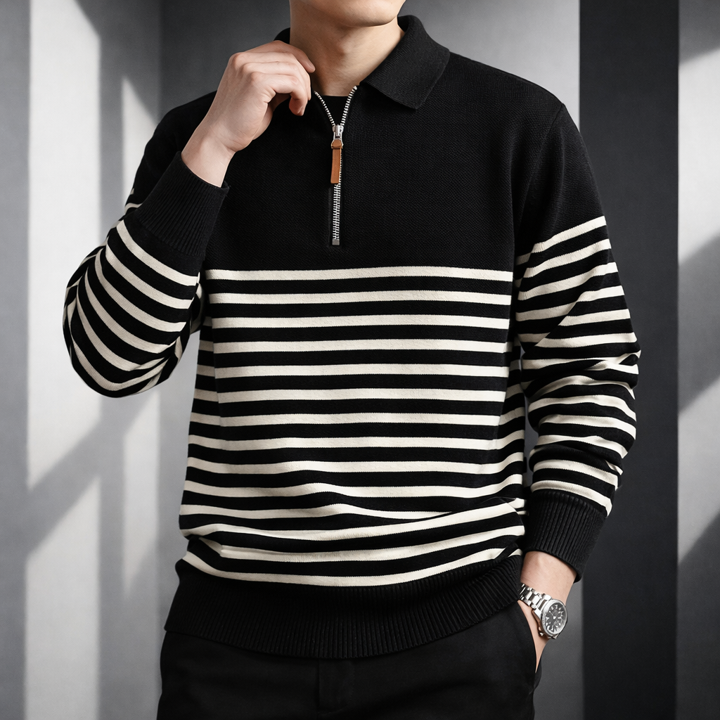 Black and cream striped quarter-zip polo worn by a male model, shown from the front.