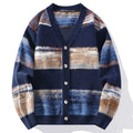 V-neck knit cardigan featuring a textured rippled stripe pattern in blue, tan, and white with a button-front closure.