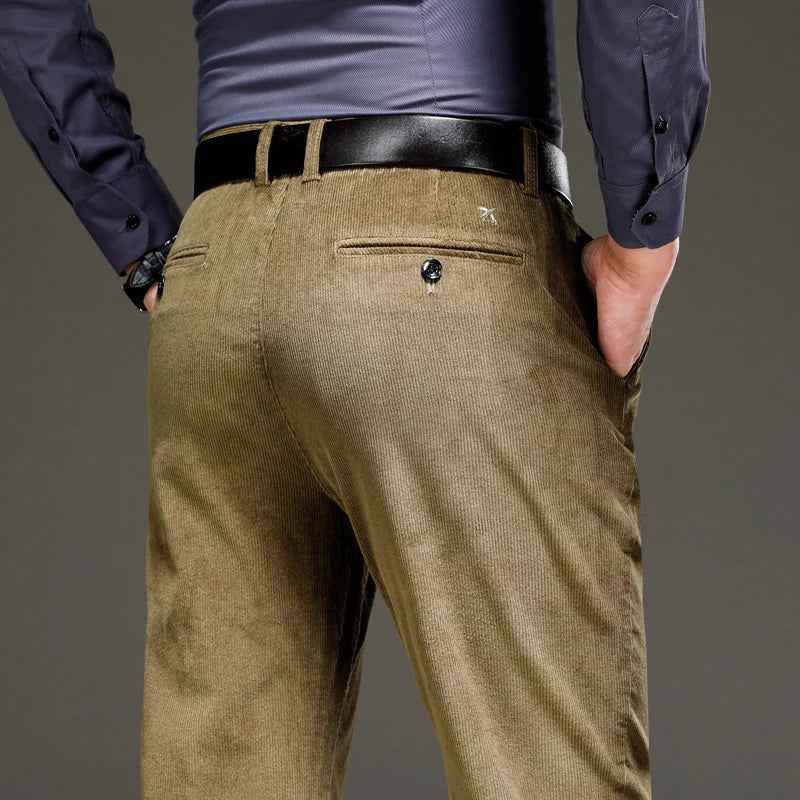 Olive-brown corduroy pants showing the front and back pocket details