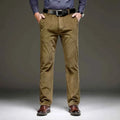 Tailored olive-brown corduroy pants with zip fly, button closure and belt loops