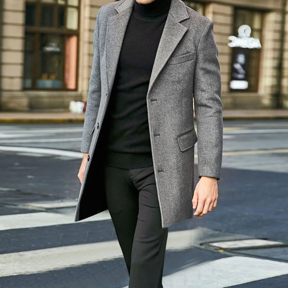 Gray Tailored Single-Breasted Overcoat worn by a male model outdoors, featuring notch lapels, a button front, flap pockets, and a tailored longline silhouette.