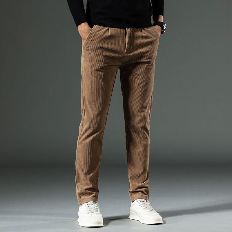 Brown tapered fine-wale corduroy pants with a clean, slim fit