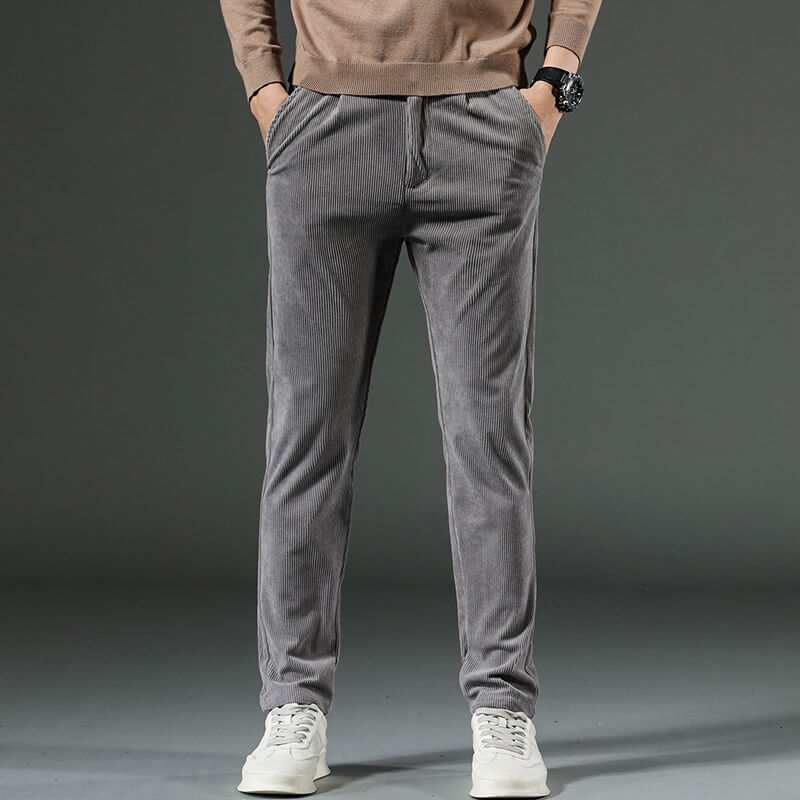 Gray tapered fine-wale corduroy pants with a smooth finish and front pockets