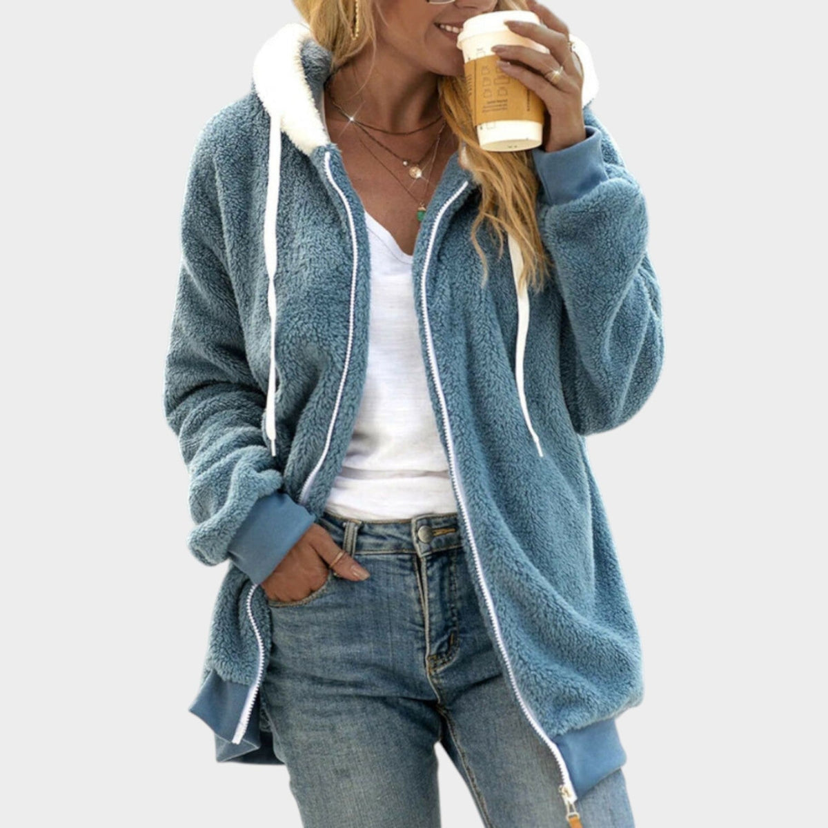 Teddy Fleece Zip-Up Hoodie – Blue teddy fleece hoodie worn by a female model with contrast sherpa trim and side pockets