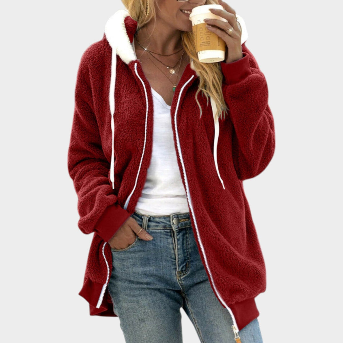 Teddy Fleece Zip-Up Hoodie – Red teddy fleece hoodie worn by a female model with contrast sherpa trim and side pockets