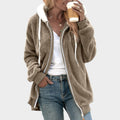 Teddy Fleece Zip-Up Hoodie –Khaki teddy fleece hoodie worn by a female model with contrast sherpa trim and side pockets