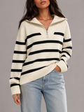 Cream and black striped mid-weight knit half-zip sweater with a relaxed drop-shoulder fit and ribbed cuffs.