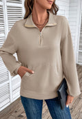 Beige quarter-zip sweatshirt in stretch jersey with a folded collar, drop shoulders, and a front kangaroo pocket.