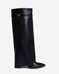 Black knee-high leather riding boots with a pointed toe, side zipper, and low block heel displayed on a white background.