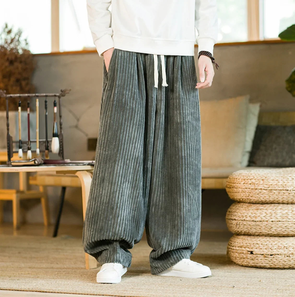 Gray wide-leg corduroy pants with relaxed wide-leg fit