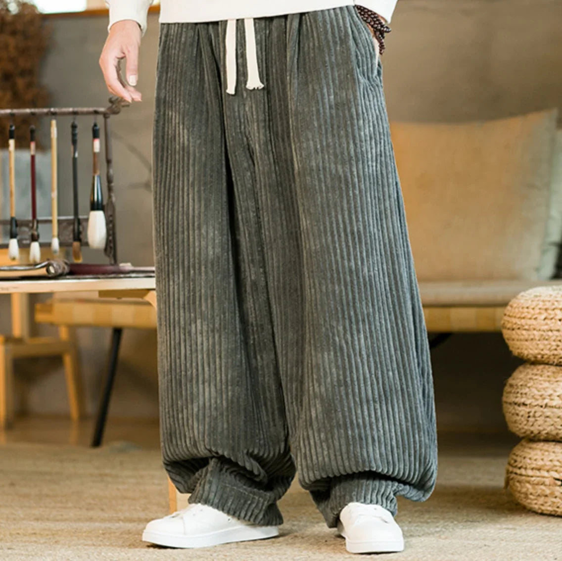 Gray wide-leg corduroy pants with elastic drawstring waist