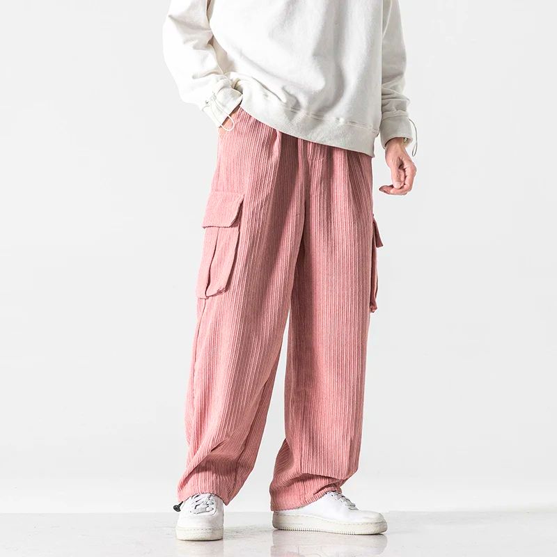 Pink wide-wale corduroy cargo pants with flap thigh pockets and drawstring waist
