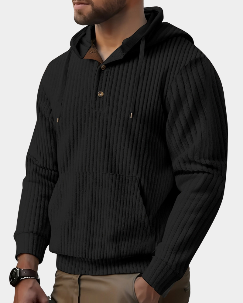 Black wide-wale ribbed henley hoodie worn by a male model, shown from the front.