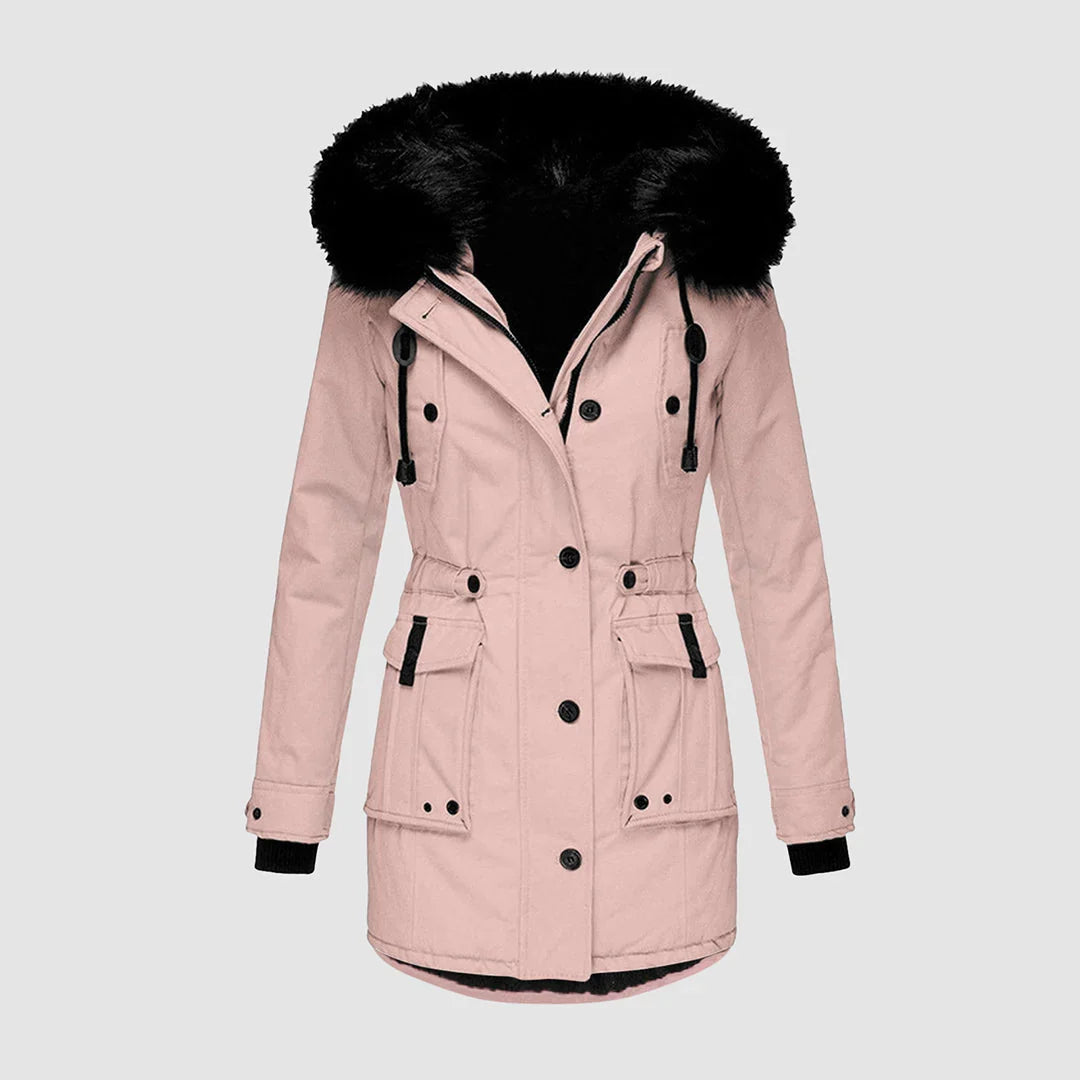 Blush pink winter parka with a plush black faux fur hood, drawstring waist, button-front closure, and patch pockets.