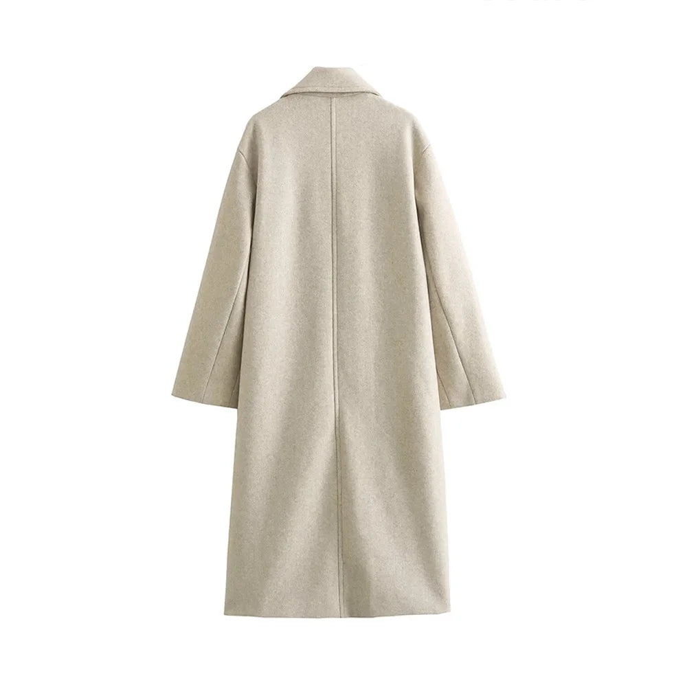 Back view of a light cream women's oversized longline wool coat showing a straight silhouette and dropped shoulders against a plain white background.