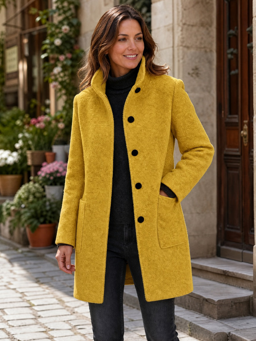 Yellow wool-blend coat with a stand collar, button front and patch pockets