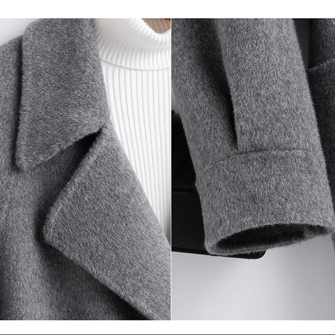 Split close-up image showing the notched lapel collar and the sleeve cuff stitching on the grey wool coat.