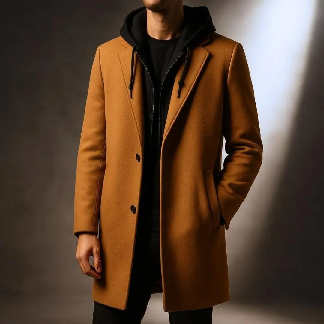 Camel Wool-Blend Longline Overcoat worn by a male model, featuring a built-in hood, full-zip front, button closure, side pockets, and tailored longline fit.