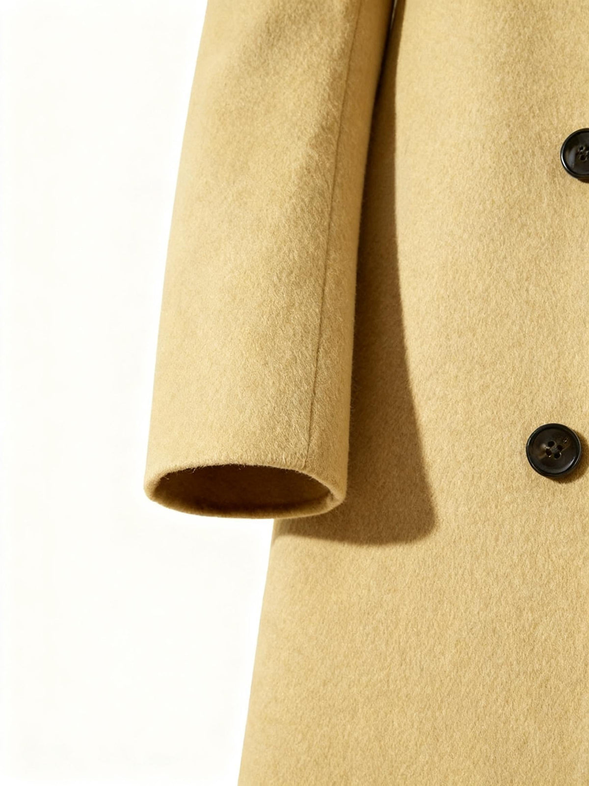 Close-up of the camel Wool-Blend Longline Trench Coat sleeve, showing the tailored cuff and smooth wool-blend fabric.
