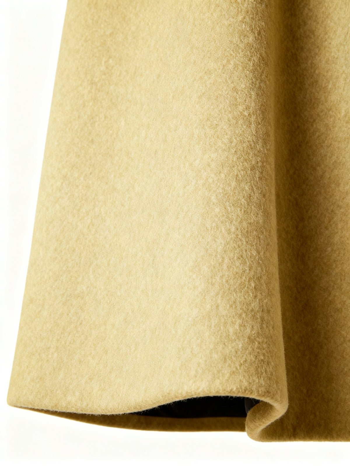Close-up of the camel Wool-Blend Longline Trench Coat front panel, highlighting the smooth fabric and single-breasted button detail.