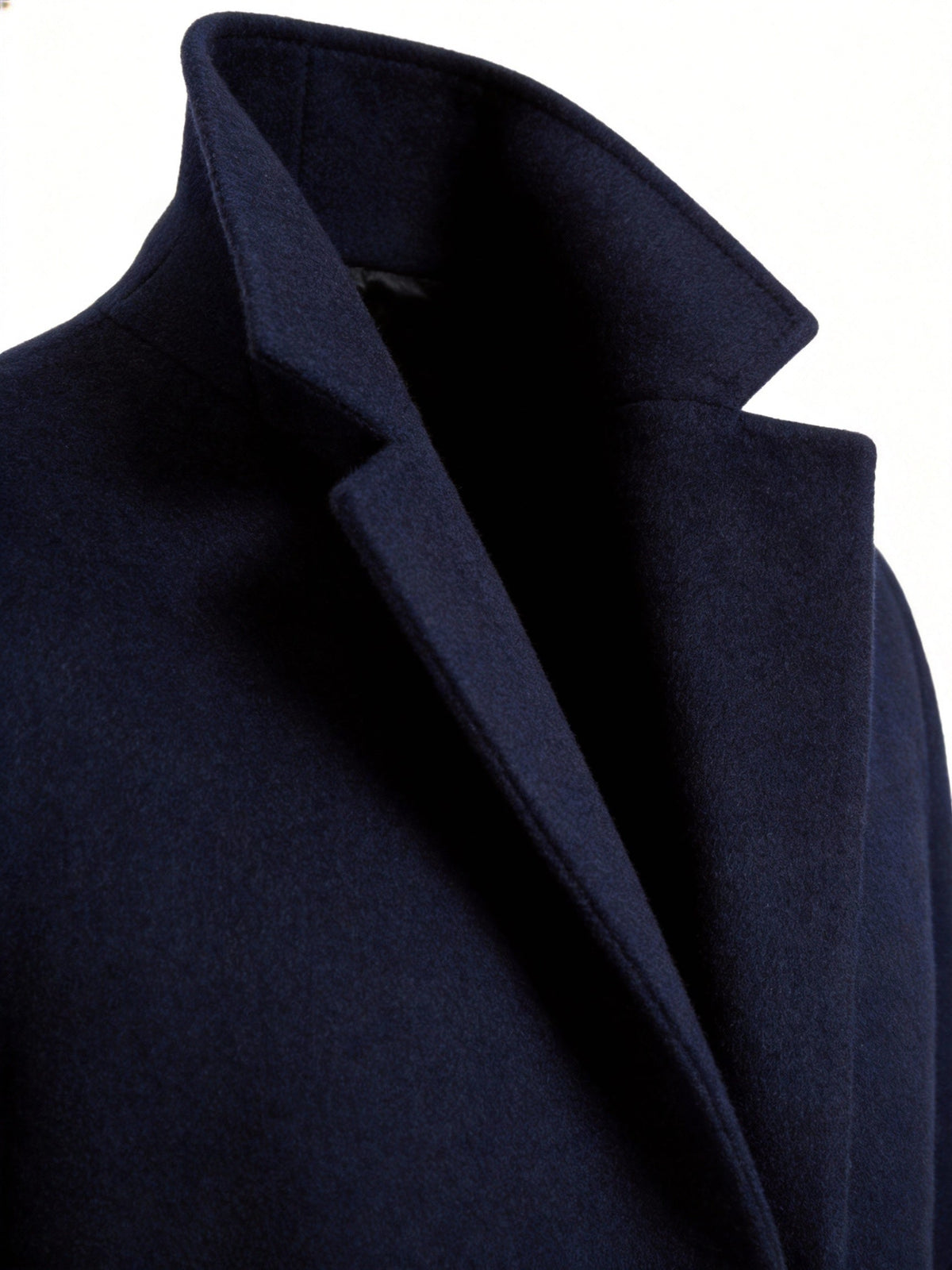 Close-up of the navy Wool-Blend Longline Trench Coat showing the notch collar, structured lapels, and tailored neckline.
