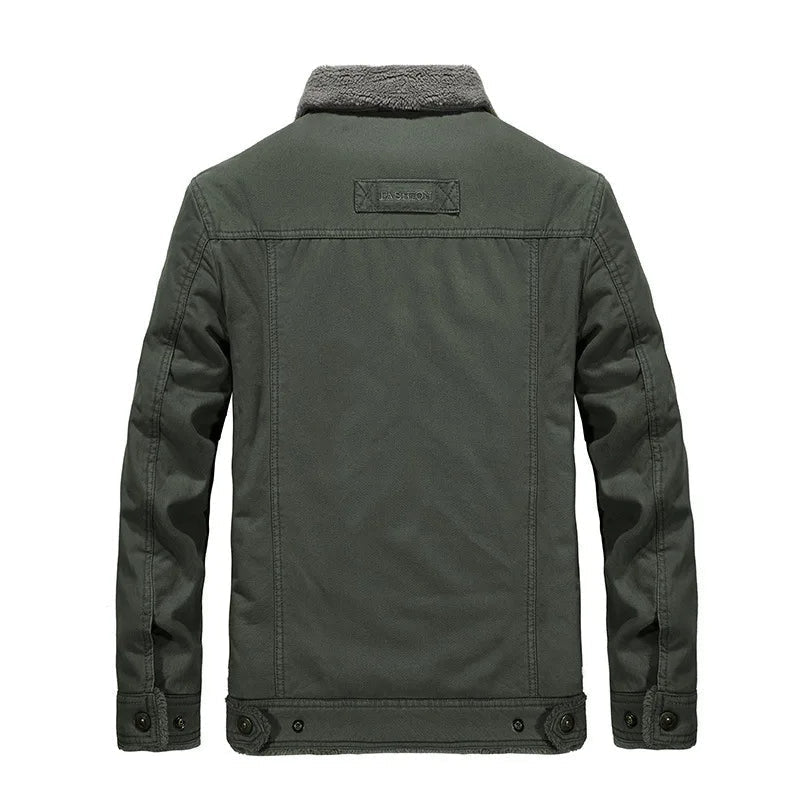 Back view of the olive green wool-lined utility jacket displaying the clean back yoke, hem tabs, and sherpa collar.