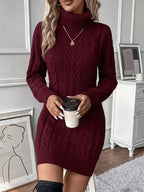 Burgundy cable-knit turtleneck sweater dress with a ribbed collar and fitted H-line silhouette.
