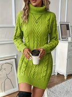 Lime green cable-knit sweater dress with a high turtleneck and ribbed trim in a structured H-line silhouette.