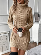 Beige cable-knit sweater dress with a high turtleneck, long sleeves, and a structured H-line silhouette.